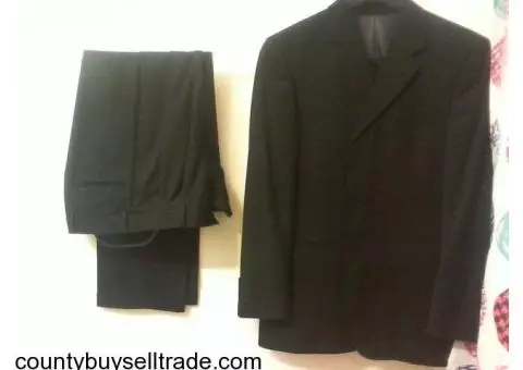 Men's matching black suit.